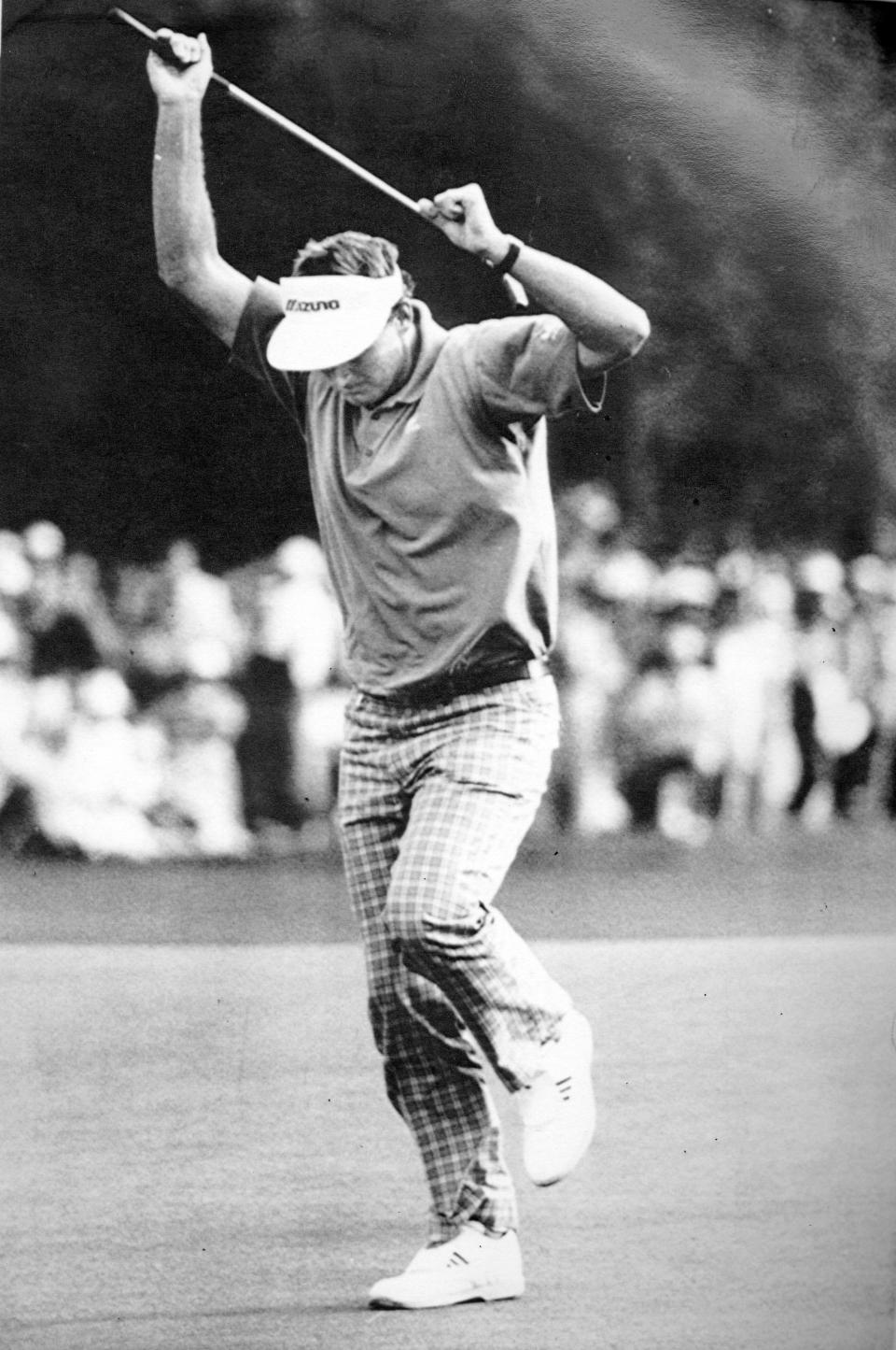 Sandy Lyle does a victory dance on the 18th at the Augusta National Golf Club after winning the Masters Championship in Augusta, GA April 10, 1988.