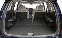 <p>To really haul, fold those rearmost seats flat; in this mode (pictured here), the Pilot can carry a whopping 47 cubic feet of stuff. </p>