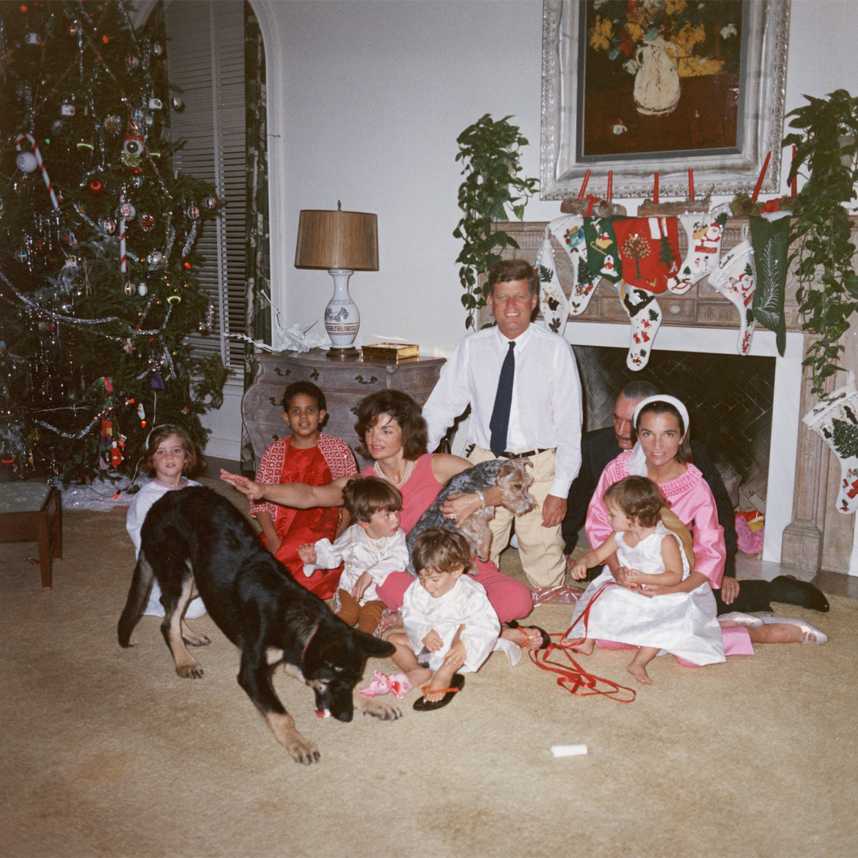 U.S. President John F. Kennedy (1917 - 1963) (C) and First Lady Jacqueline Kennedy (1929 - 1994) pose with their family on Christmas Day