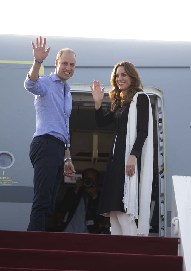 William shows his friendship bracelet from the village as they left Pakistan on Friday (Ian Vogler/PA Wire)