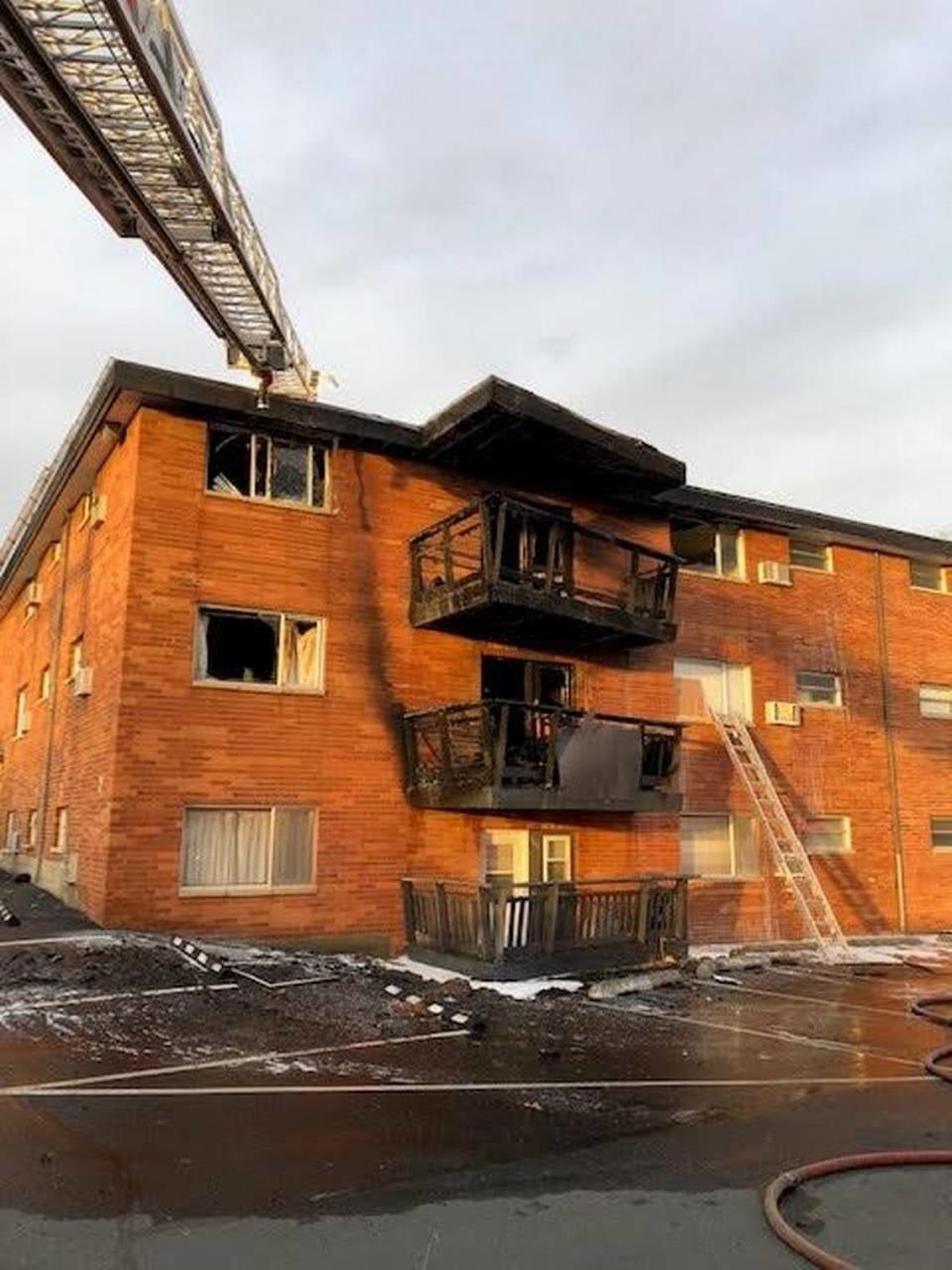 Fire spread in a second and third floor units of the Dolphin Apartment complex in Kennewick Friday afternoon.