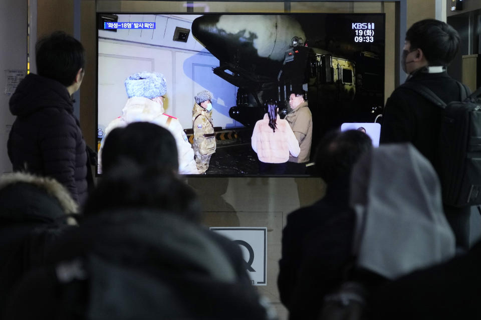 A TV screen shows an image of North Korean leader Kim Jong Un during a news program at the Seoul Railway Station in Seoul, South Korea, Tuesday, Dec. 19, 2023. Kim threatened "more offensive actions" to repel what he called increasing U.S.-led military threats after he supervised the third test of his country's most advanced missile designed to strike the mainland U.S., state media reported Tuesday. (AP Photo/Ahn Young-joon)