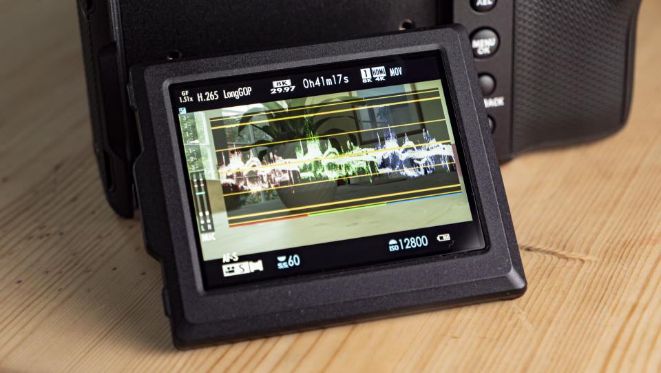 Close up of the Fujifilm GFX100 II 's rear LCD displaying video waveform and vector info