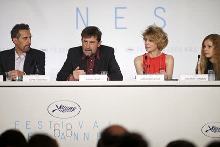 Director Nanni Moretti (2ndL), cast members John Turturro (L), Margherita Buy and Beatrice Mancini attend a news conference for the film "Mia madre" (My Mother) in competition at the 68th Cannes Film Festival in Cannes, southern France, May 16, 2015. REUTERS/Benoit Tessier