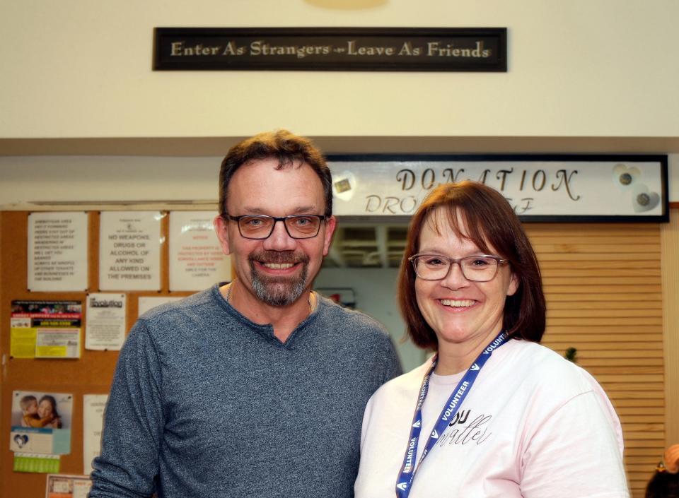 Scott and Kathleen LaBonte pose in the lobby of Pay It Forward, Friday, December 15, 2023, in Sheboygan, Wis.