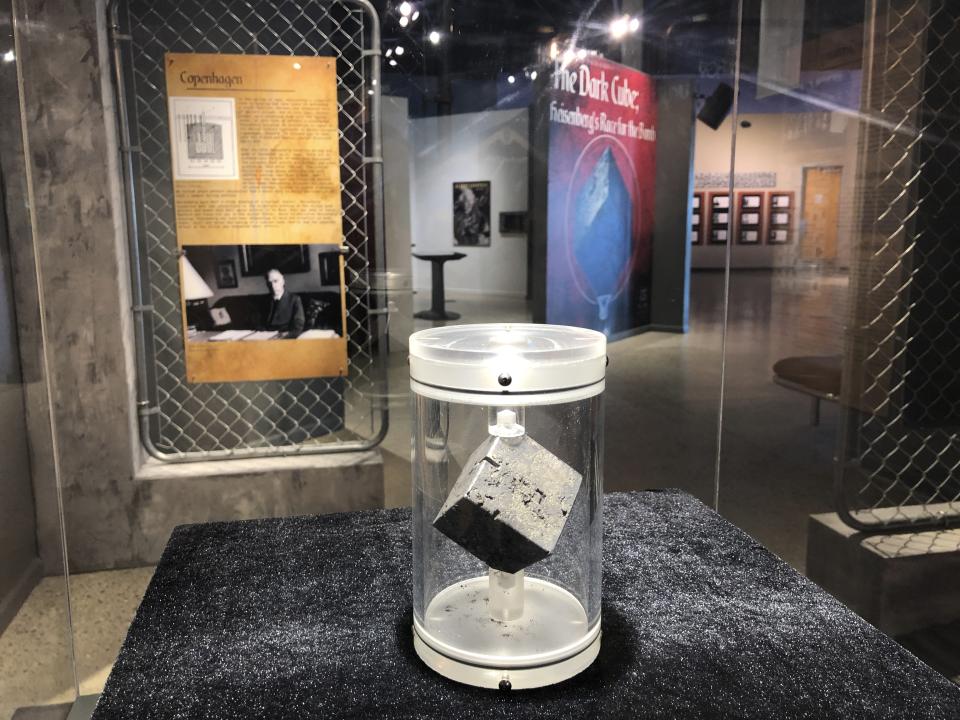 A cube of uranium is displayed Wednesday, July 15, 2020, at the National Museum of Nuclear Science and History in Albuquerque, N.M. The "Dark Cube" was part of Adolf Hilter's last attempt at a nuclear reactor and represented a threat that helped to propel the United States' secret Manhattan Project to develop the atomic bomb. Thursday marked the 75th anniversary of the world's first atomic detonation. (AP Photo/Susan Montoya Bryan)