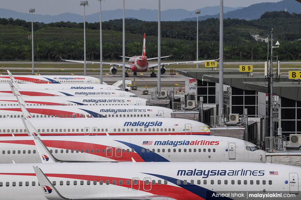 The tourism and airline industries were badly impacted. Malaysia Airlines planes are seen parked at Kuala Lumpur International Airport in Sepang, Selangor on Oct 18, 2020.