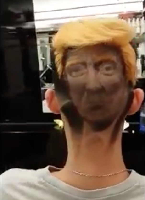 The man now has Donald Trump's face etched in the back of his head. (Photo: Storyful)