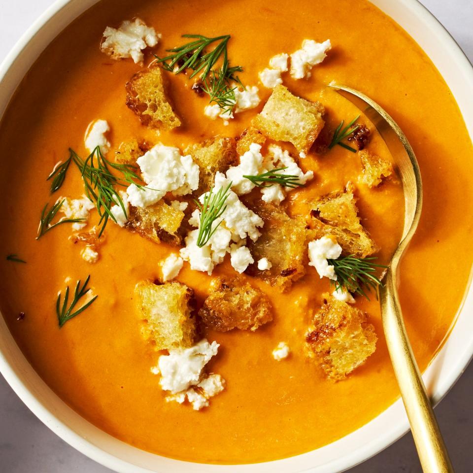 baked feta soup with crumbled feta and fresh dill