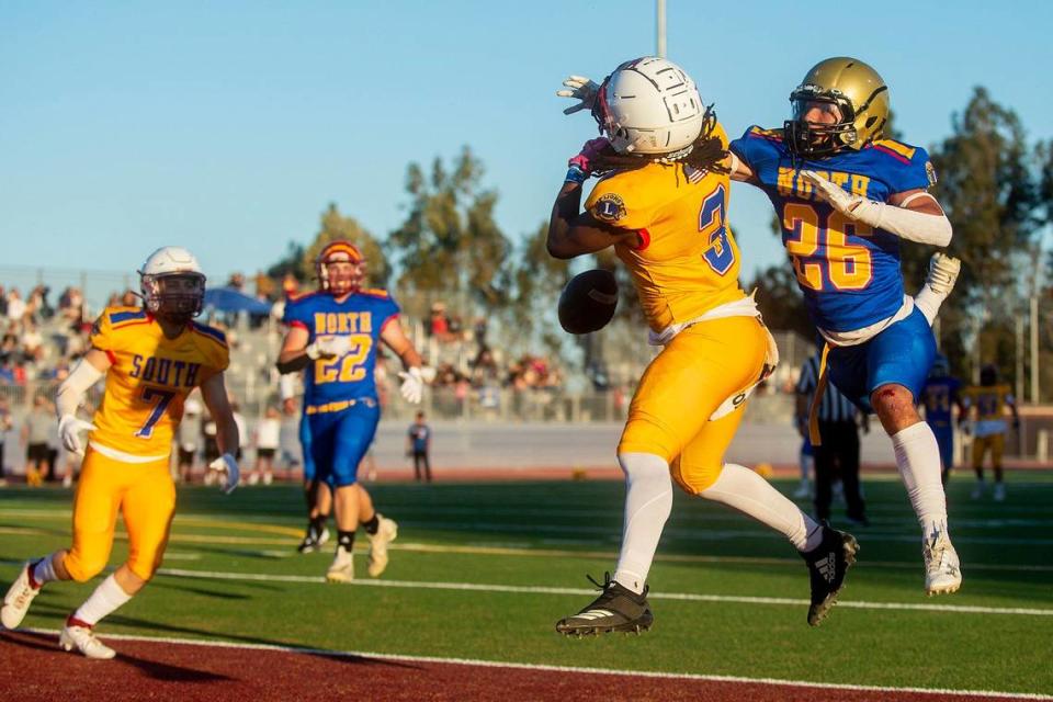 North All-Star Marcello Avalos (26) representing Buhach Colony, breaks up a pass intended for South All-Star Jonah White (3) representing Golden Valley, during the Merced County All-Star Football Game at Golden Valley High School in Merced, Calif., on Saturday, June 15, 2024. The South All-Stars beat the North All-Stars 33-20.