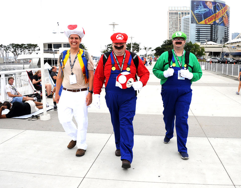 <p>Cosplayers dressed as Toad, Mario, and Luigi at Comic-Con International on July 20 in San Diego. (Photo: Albert L. Ortega/Getty Images) </p>