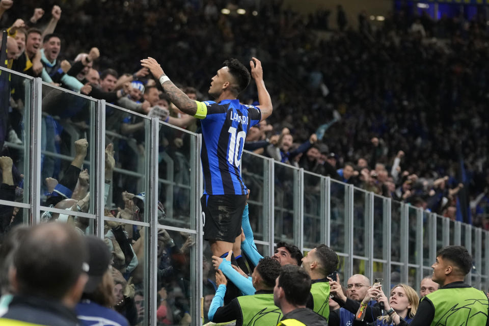 Inter Milan's Lautaro Martinez celebrates after scoring his side's opening goal during the Champions League semifinal second leg soccer match between Inter Milan and AC Milan at the San Siro stadium in Milan, Italy, Tuesday, May 16, 2023. (AP Photo/Luca Bruno)