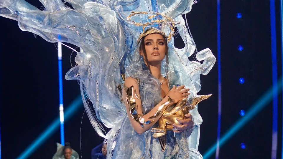Miss Ukraine's costume addressed the war in her country — it represented a mother's love for her child, commentators explained, and hope for a sky free from Russian missiles. - Alex Peña/Getty Images