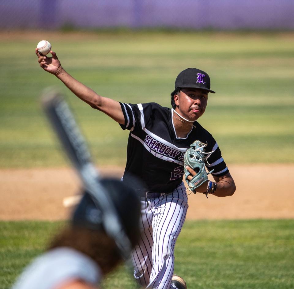 Shadow Hills' Caleb Ortiz (23) winds up a pitch during their CIF-SS semifinal game at Shadow Hills High School in Indio, Calif., Tuesday, May 16, 2023. 