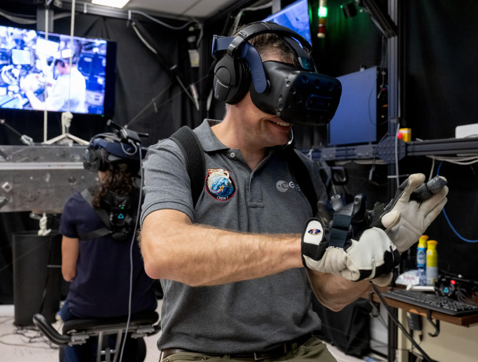 European Space Agency astronaut Andreas Mogensen will be the first to use the HTC Vive Focus 3 on the International Space Station, for an experiment meant to augment mental health. Here, he enters virtual reality for spacewalk training during a ground exercise at NASA's Johnson Space Center in Houston.