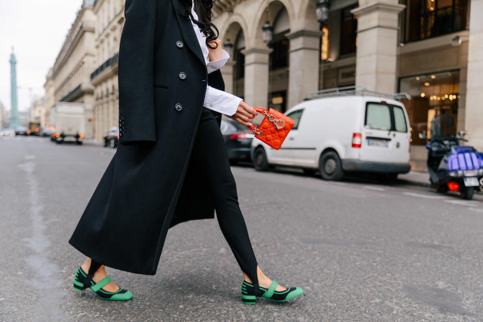 Dior’s black technical fabric and green rubber Roller Ballerina flat. - Credit: Allie Provost