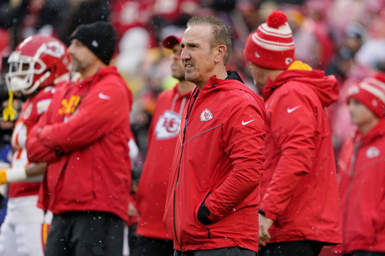 Chiefs defensive coordinator Steve Spagnuolo watches warmups prior to an NFL Divisional playoff football game against the Jaguars.