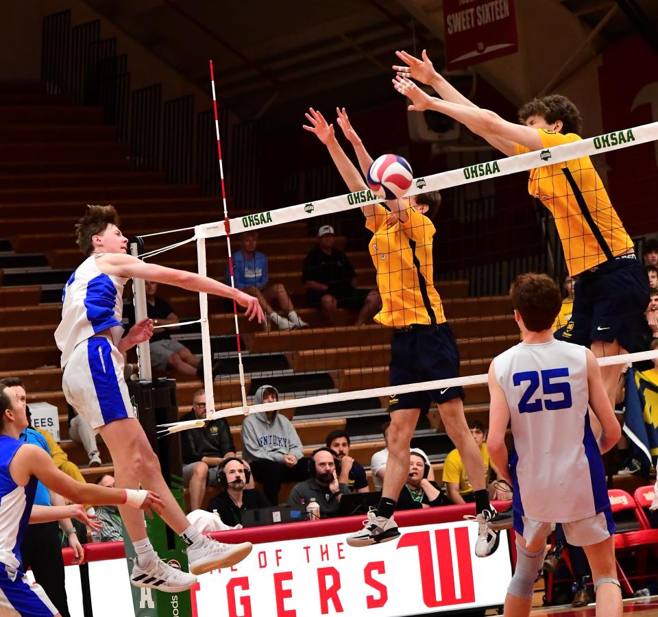 Colin Yox (No. 6) and Will Patterson combine for a block and kill for Moeller at the inaugural OHSAA Division I Boys Volleyball State Championship, May 28, 2023.
