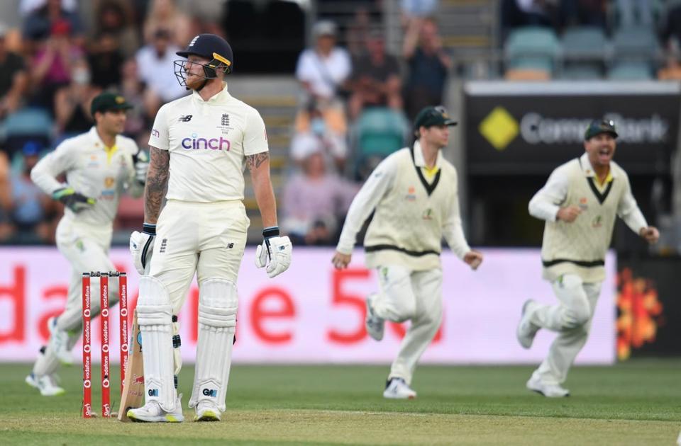 England’s Ben Stokes reacts after losing his wicket off the bowling of Australia’s Mitchell Starc (Darren England via AAP/PA) (PA Media)