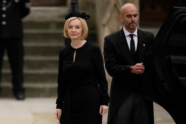 LONDON, ENGLAND - SEPTEMBER 19: Prime Minister of The United Kingdom, Liz Truss arrives at Westminster Abbey on September 19, 2022 in London, England. Elizabeth Alexandra Mary Windsor was born in Bruton Street, Mayfair, London on 21 April 1926. She married Prince Philip in 1947 and ascended the throne of the United Kingdom and Commonwealth on 6 February 1952 after the death of her Father, King George VI. Queen Elizabeth II died at Balmoral Castle in Scotland on September 8, 2022, and is succeeded by her eldest son, King Charles III.  (Photo by Christopher Furlong/Getty Images)
