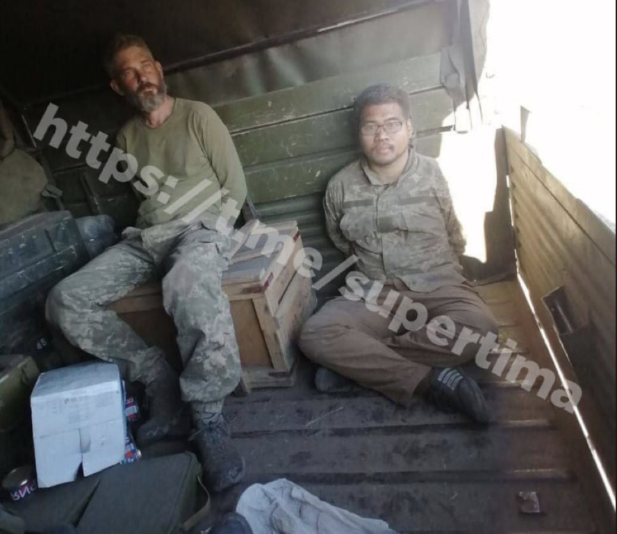 A photo posted on @supertima via Telegram reported to be U.S. veterans Alex Drueke and Andy Tai Ngoc Huynh being held captive.