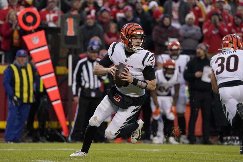 Cincinnati Bengals quarterback Jake Browning drops back to pass during the first half of an NFL football game against the Kansas City Chiefs Sunday, Dec. 31, 2023, in Kansas City, Mo. (AP Photo/Ed Zurga)