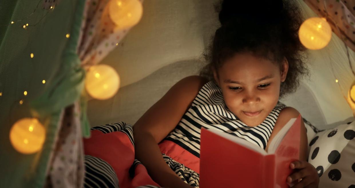 <span class="caption">The growth of benefits derived from reading for pleasure starts young.</span> <span class="attribution"><span class="source">(Shutterstock)</span></span>