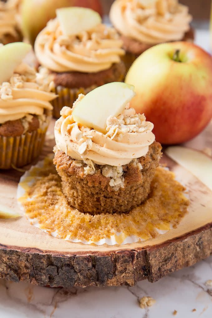 <p>Style these cupcakes with sliced apples and crunchy crumbles.</p><p><strong><a href="https://www.anniesnoms.com/2016/10/04/apple-crumble-cupcakes/" rel="nofollow noopener" target="_blank" data-ylk="slk:Get the recipe at Annie's Noms;elm:context_link;itc:0;sec:content-canvas" class="link ">Get the recipe at Annie's Noms</a>.</strong></p>