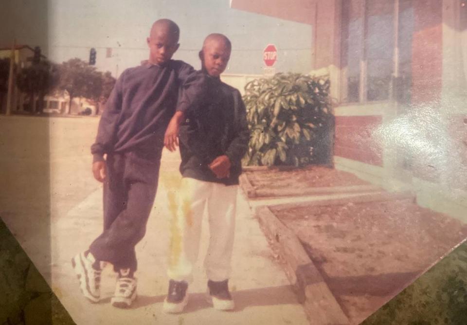 From left to right: Emmanuel Jean, 9, poses for a photo with his brother Nahum Jean, 8, in North Miami.