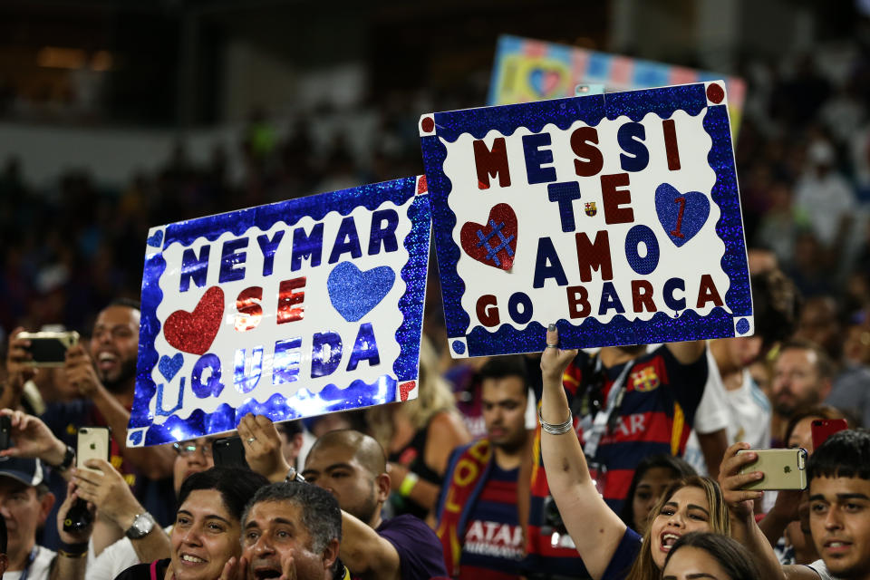 MIAMI GARDENS, FL - JULY 29: Fans of FC Barcelona hold up banners for Neymar of FC Barcelona and Lionel Messi  of FC Barcelona during the International Champions Cup 2017 match between Real Madrid and FC Barcelona at Hard Rock Stadium on July 29, 2017 in Miami Gardens, Florida. (Photo by Robbie Jay Barratt - AMA/Getty Images)