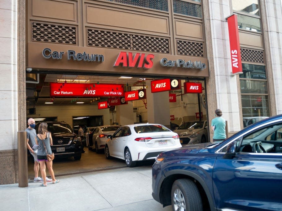 Cars entering an Avis depot