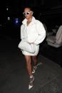 <p>In a white pullover by The Frankie Shop, leather skirt by Fenty, lace-up pumps, sunglasses, croc clutch, and oversized hoop earrings while arriving to a Fabergé event in London. </p>