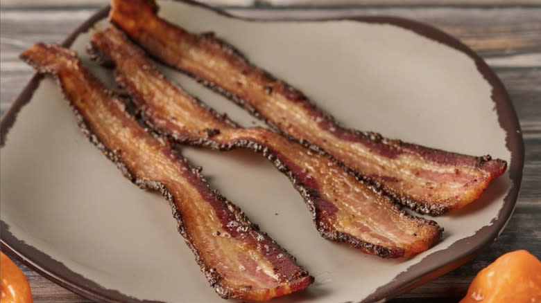 slices of bacon on plate