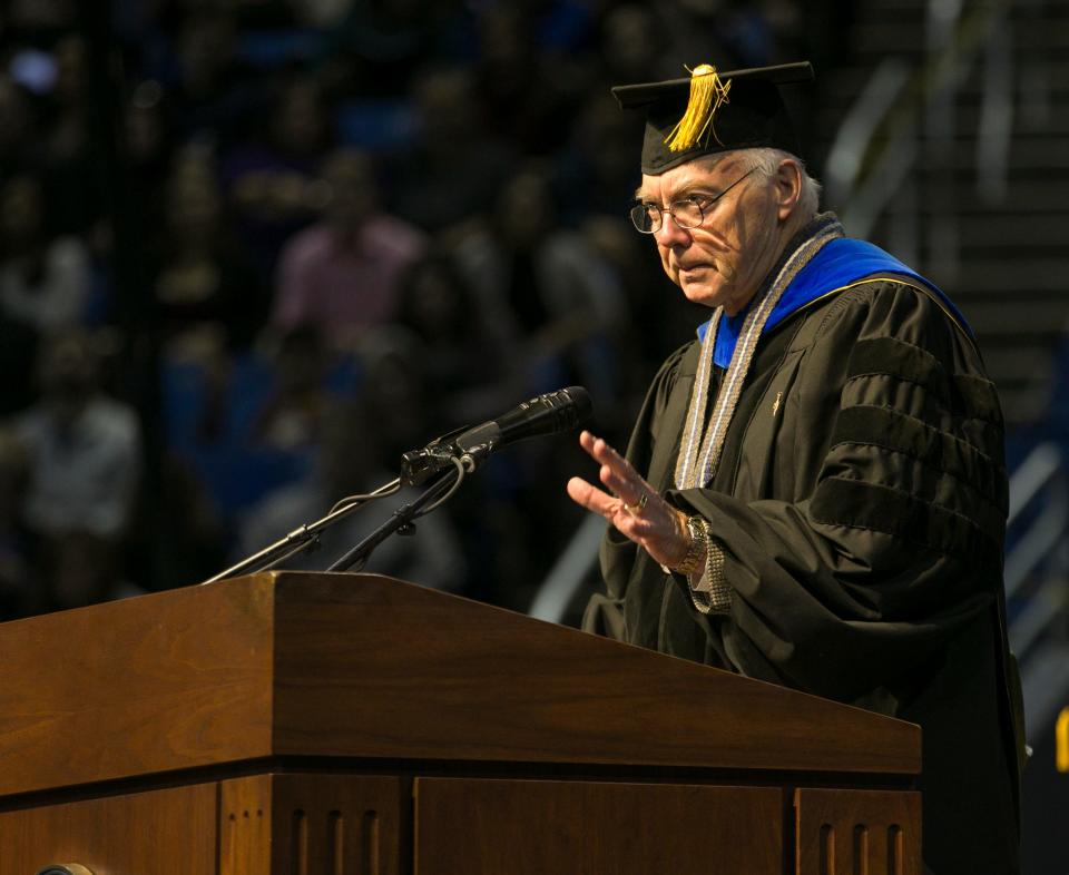 University President Marc A. Johnson speaks during a December 2019 graduation ceremony.