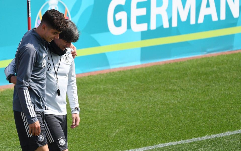 Kai Havertz on the training ground with Germany manager Joachim Low - AFP