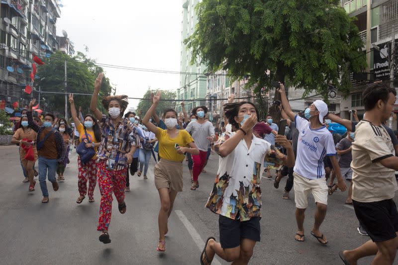 Hundreds of Myanmar activists hold flash mob protest against military rule