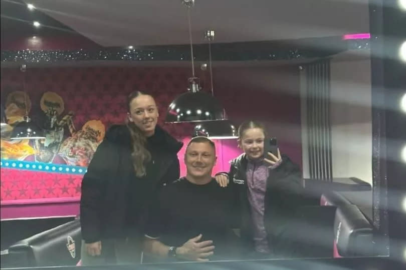 Kevin with his two daughters, aged 10 and 14