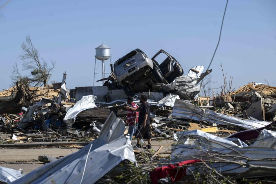 A view of damage after a tornado tore through Mississippi.