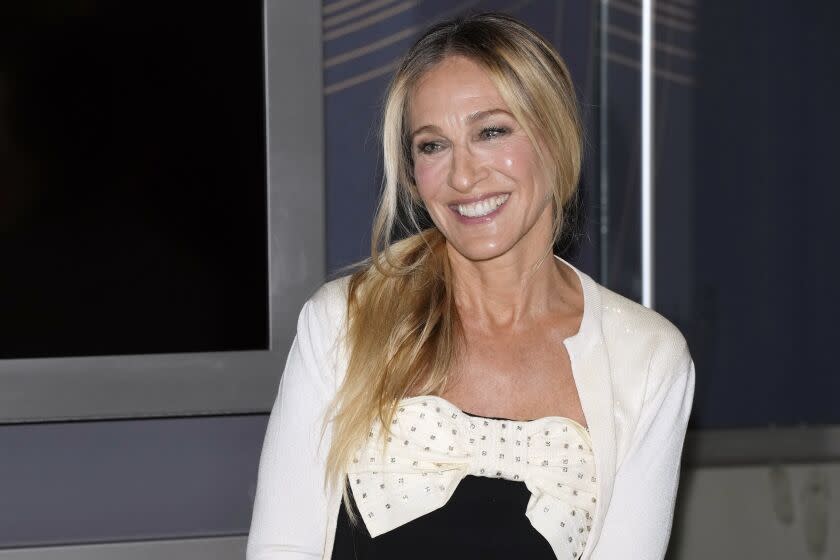 Sarah Jessica Parker participates in the Empire State Building lighting ceremony to celebrate the 25th anniversary of "Sex and the City" and the season 2 premiere of "And Just Like That" on Wednesday, June 21, 2023, in New York. (Photo by Charles Sykes/Invision/AP)