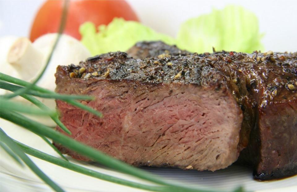 <p>To cook a medium-well steak, which has a slightly pink center, the temperature of the steak should be 150 degrees Fahrenheit. </p>