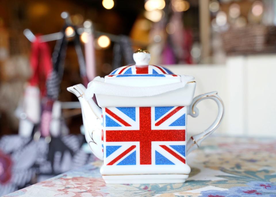 This British flag inspired tea pot will be used by twin sisters Alice Williams and Gemma Riddle, the owners of the British Tea Garden, during their celebration of the coronation of King Charles III and his wife, Camilla, as queen consort Saturday with customers.