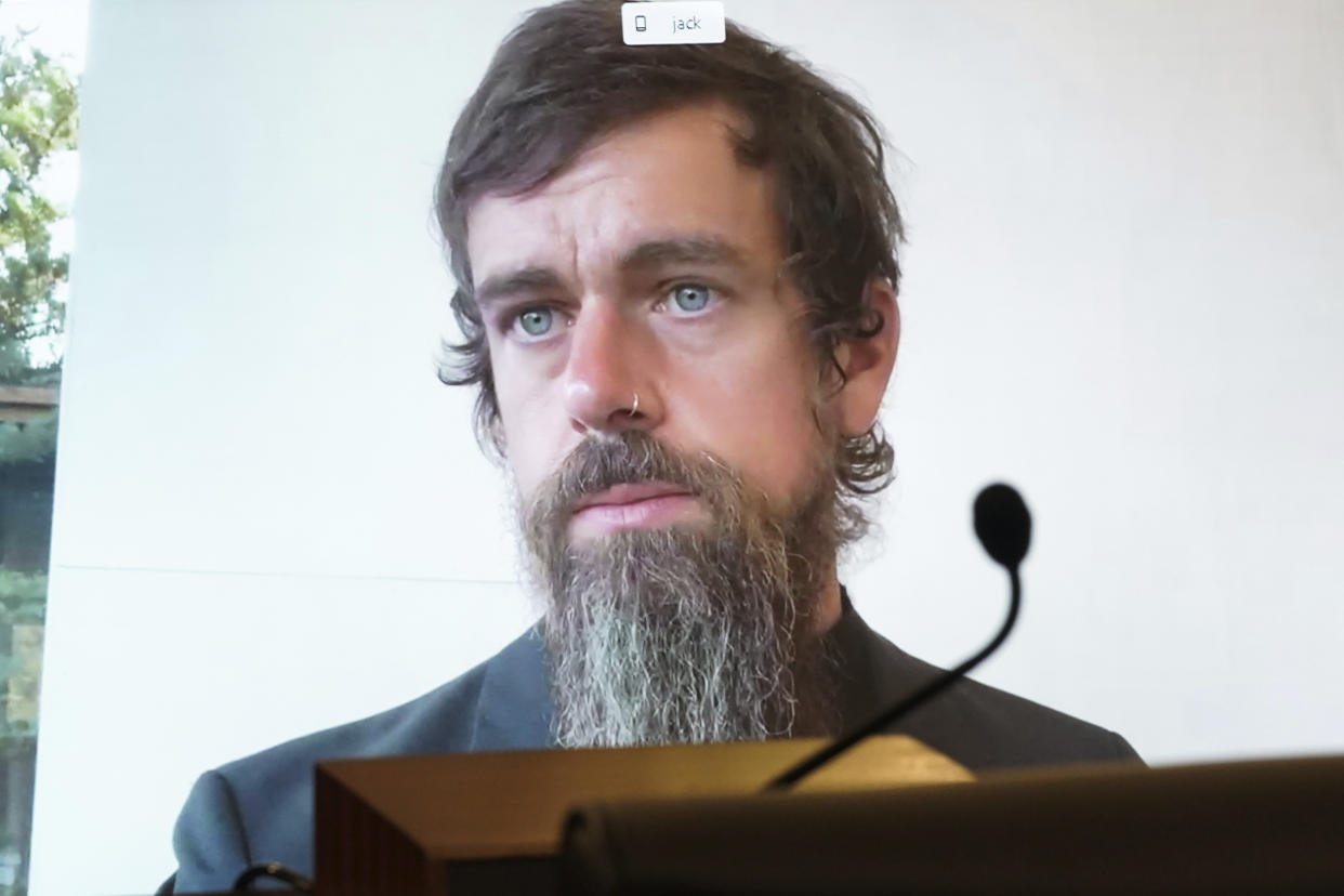 Twitter CEO Jack Dorsey appears on a screen as he speaks remotely during a hearing before the Senate Commerce Committee on Capitol Hill, Wednesday, Oct. 28, 2020, in Washington. The committee summoned the CEOs of Twitter, Facebook and Google to testify during the hearing. (Greg Nash/Pool via AP)