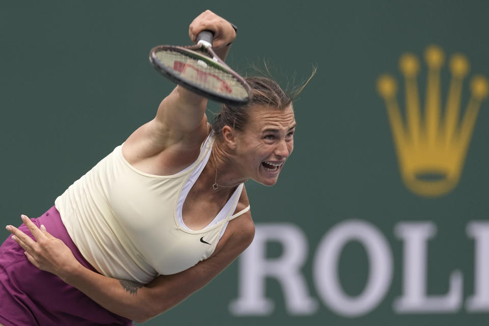 Aryna Sabalenka, of Belarus, serves to Elena Rybakina, of Kazakhstan, during the women's singles final at the BNP Paribas Open tennis tournament Sunday, March 19, 2023, in Indian Wells, Calif. (AP Photo/Mark J. Terrill)