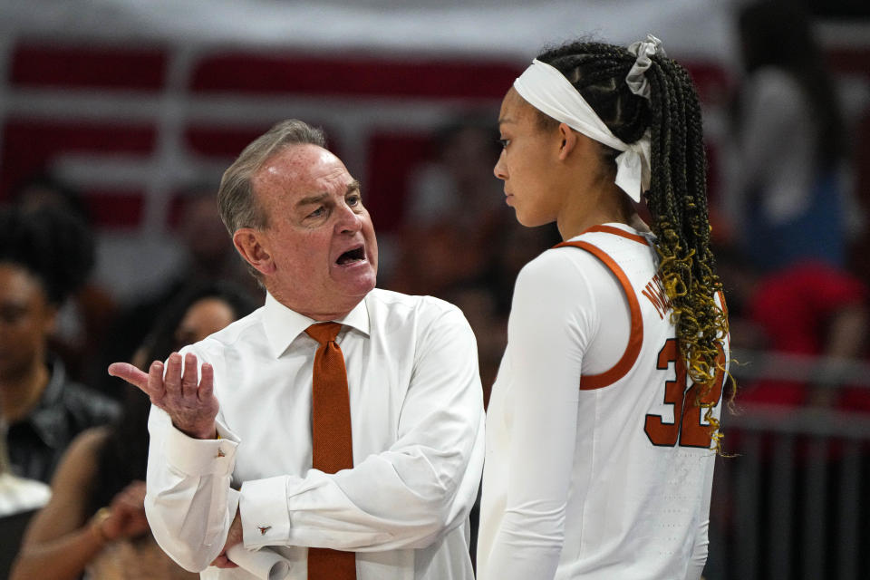 Texas head coach Vic Schaefer talks to Ndjakalenga Mwenentanda after taking her out of the women’s NCAA Tournament game against Louisville at Moody Center in March.