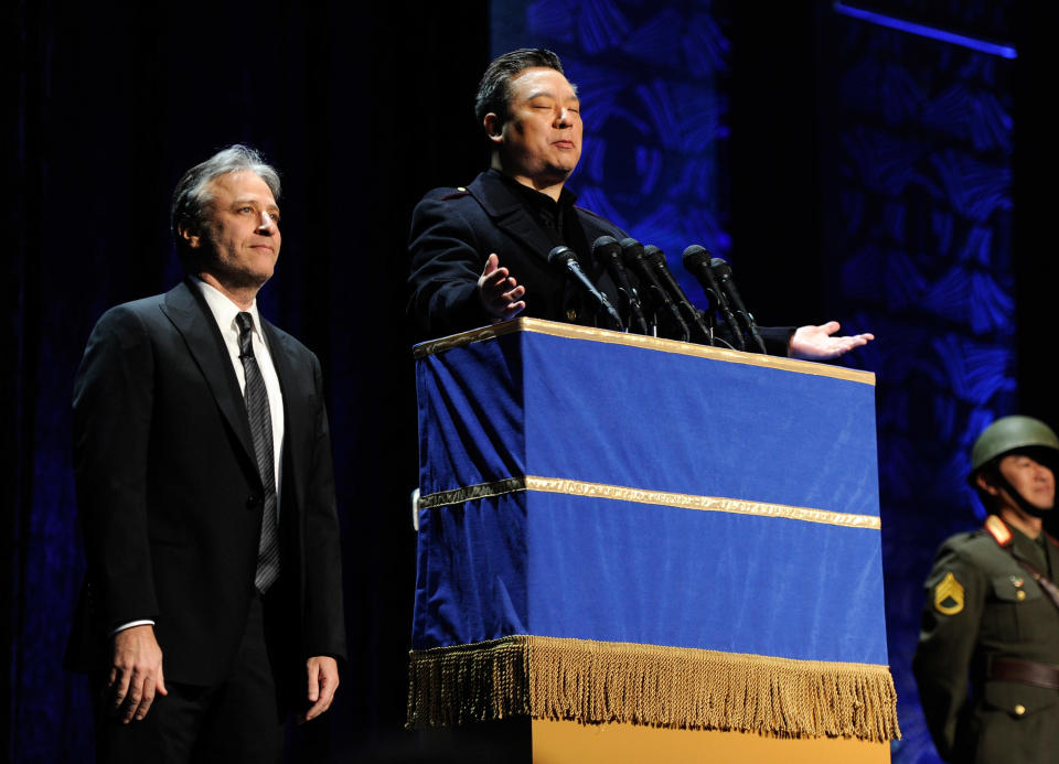 NEW YORK, NY - MARCH 04:  (EXCLUSIVE COVERAGE) Jon Stewart and Rex Lee speak on stage during Amnesty International's Secret Policeman's Ball at Radio City Music Hall on March 4, 2012 in New York City.  (Photo by Kevin Mazur/Getty Images for Amnesty International)