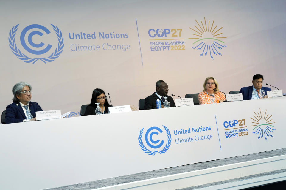 From left, Red Constantino, of V20, Sara Ahmed, of V20, Henry Kwabena Kokofu, of Ghana, Svenja Schulze, of Germany, A K Abdul Momen, of Bangladesh, attend a session at the COP27 U.N. Climate Summit, Monday, Nov. 14, 2022, in Sharm el-Sheikh, Egypt. (AP Photo/Peter Dejong)