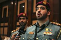 Lt. Taher Hassan al-Taher of the Dubai's civil defense speaks to journalists in Dubai, United Arab Emirates, on Sunday, Jan. 22, 2017. Dubai authorities announced Sunday the city-state had new fire safety regulations, but offered few details on how they would be enforced after a series of skyscraper fires. (AP Photo/Jon Gambrell)