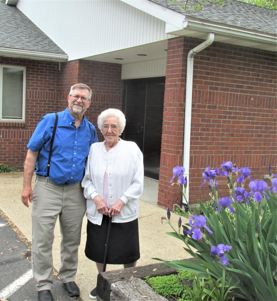 The Rev. Jim Jamison of Millersburg Baptist Church and longtime volunteer Violet Wolff outside the church on South Washington Street in Millersburg.