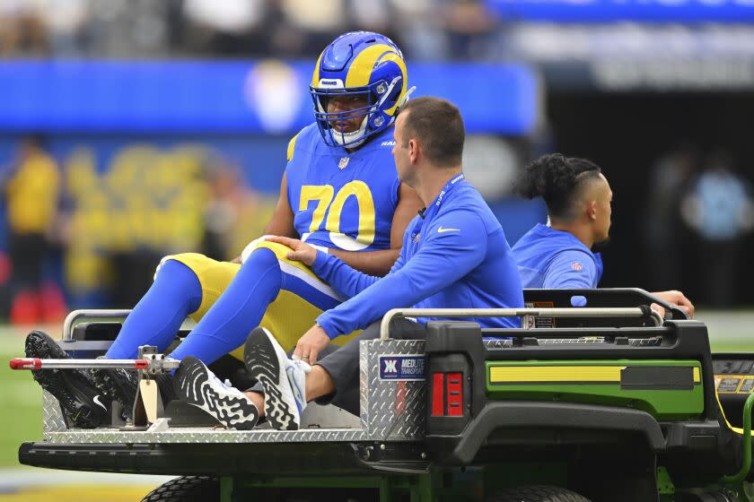 Rams offensive tackle Joe Noteboom is carted off after rupturing his Achilles tendon.