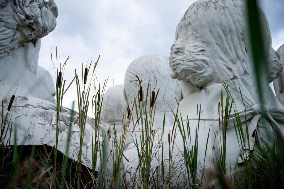 Salvaged busts of former US Presidents can be seen at a mulching business where they now reside August 25, 2019, in Williamsburg, Virginia. (Photo: Brendan Smialowski/AFP/Getty Images)